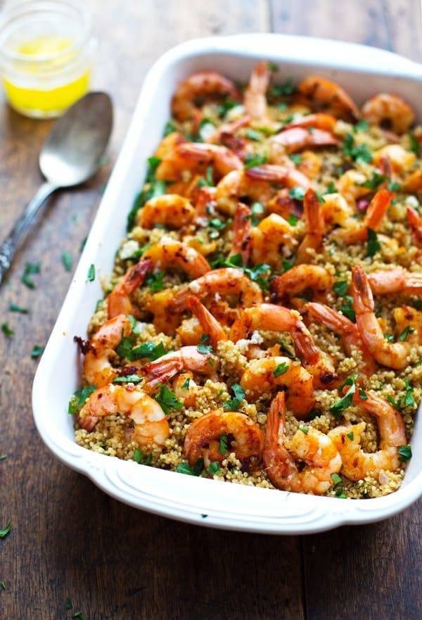 Garlic Butter Shrimp and Quinoa in a white baking dish.