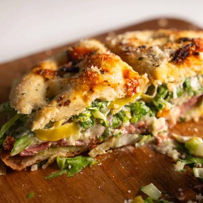 Focaccia grinder sandwich sliced.