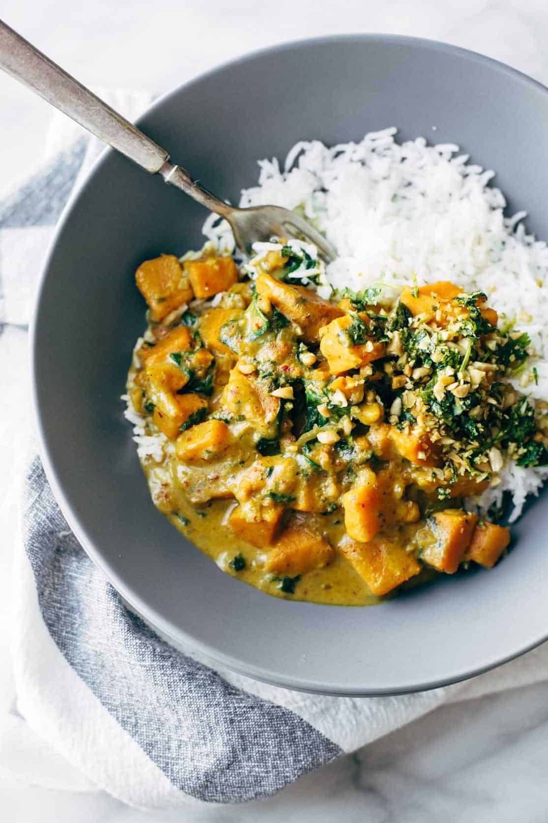 Thai sweet potato curry in a bowl with rice.