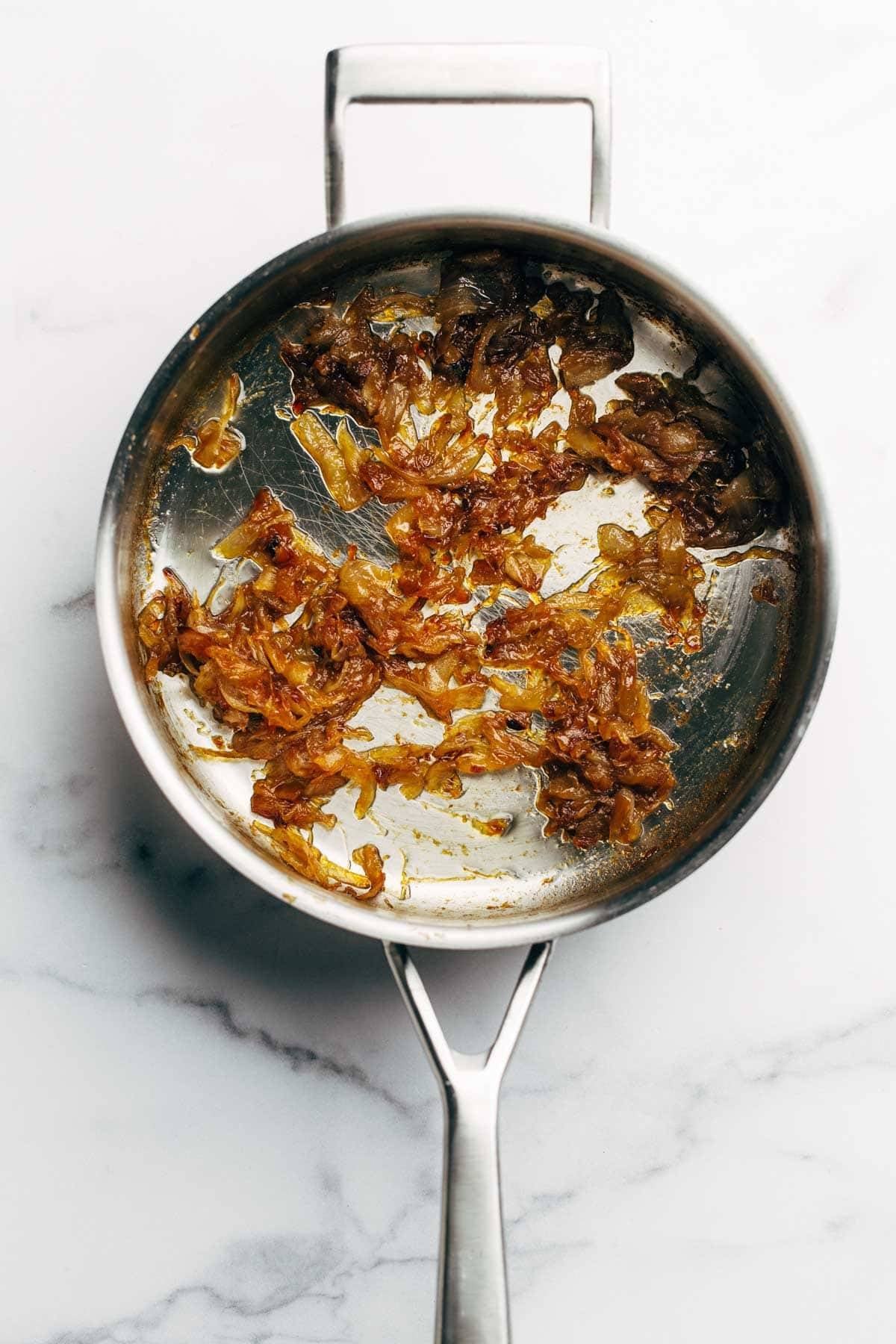 Caramelized onions in a pan.