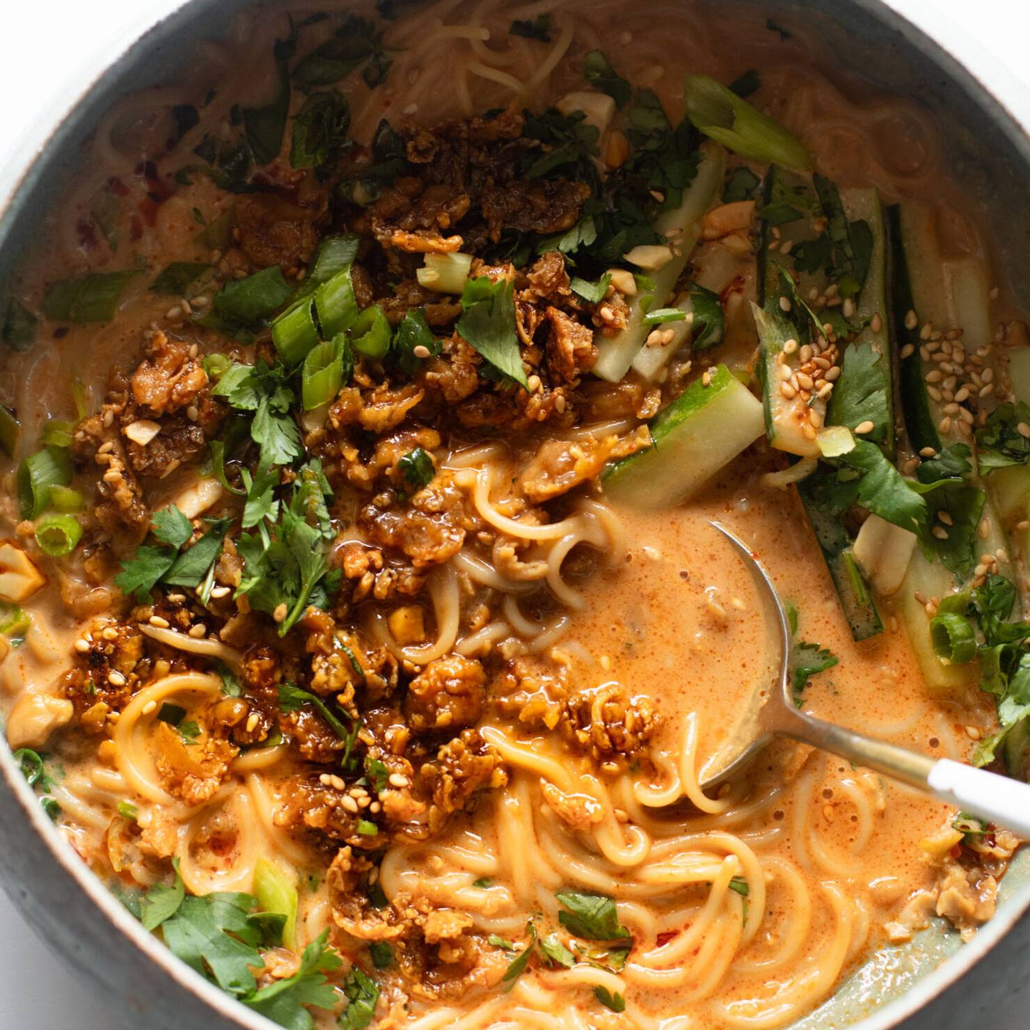 Miso peanut ramen in a bowl topped with tofu.