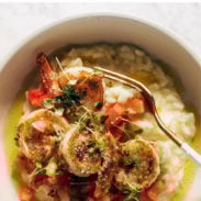 Pesto shrimp and parmesan risotto in a bowl pin