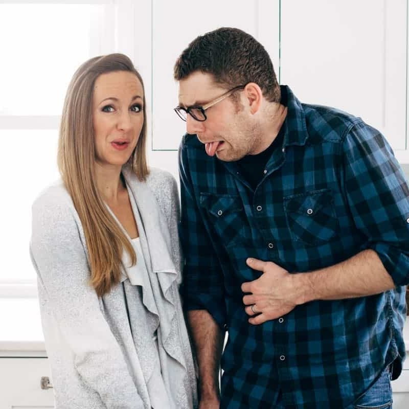 Lindsay and Bjork making silly faces in their kitchen.